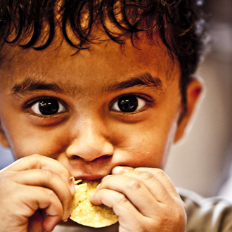 Child eating a chip