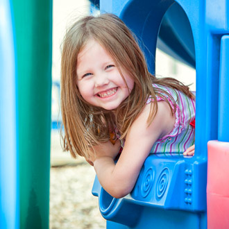 Smiling girl at summer camp