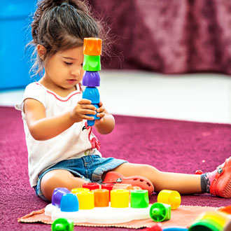 Girl playing with blocks