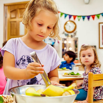 Girl serving lunch